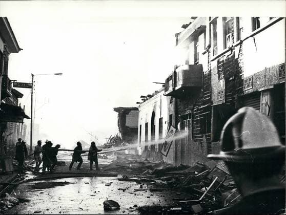 Dec. 12, 1973 - Earthquake in Nicaragua. Photo shows firemen at work on damaged buildings in Managua, the capital on Nicaragua, following last month s disastrous earthquake.  - ZUMAk09