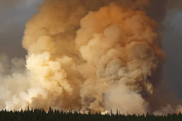 Smoke billows from a forest fire in Alberta, Canada  acp51234 photography