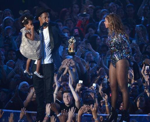 Blue Ivy Carter, Jay-Z and Beyonce accept the Video Vanguard Award at the 2014 MTV Video Music Awards at the Forum in Inglewood, California on August 24, 2014.  LAP20140824219