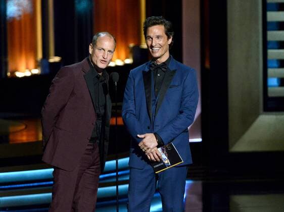 Woody Harrelson, left, and Matthew McConaughey present the award for outstanding lead actor in a miniseries or a movie during the Prime Time Emmy Awards at the Nokia Theatre in Los Angeles on August 25, 2014.  LAP20140825680