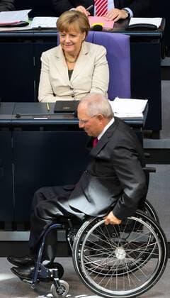 German Finance Minister Wolfgang Schaeuble (Front) and German Chancellor Angela Merkel attend a debate on the 2015 federal budget at the Bundestag, the lower house of parliament, in Berlin, Germany, on Sept. 9, 2014. ) (djj) GERMANY-BERLIN-2015 FEDERAL BUDGET-DEBATE ZhangxFan 