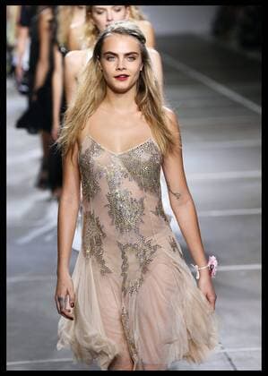. 14 09 2014. London, United Kingdom. Cara Delevingne closes the Topshop Unique show at London Fashion Week for Spring Summer 2015. xStephenxLockx xi-Imagesx IIM-2962-0001