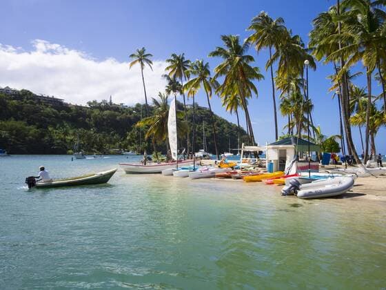 Caribbean, Saint Lucia, Marigot Bay, Beach with boats  AM001794