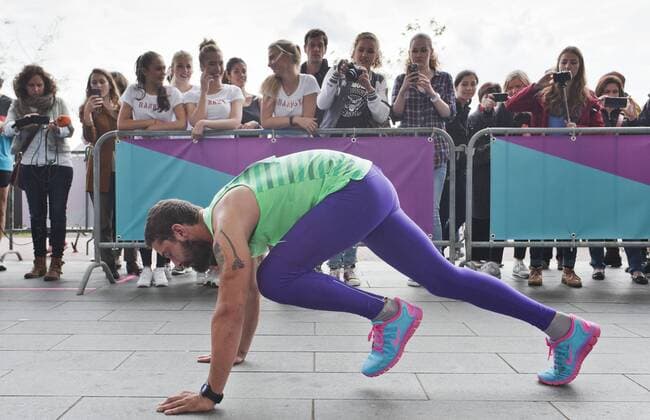Shia Labeouf runs a marathon around the Stedelijk Museum as part of the performance Metamarathon. It involves 144 rounds around the museum 