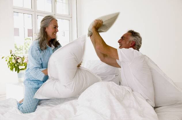Mature couple having pillow fight on bed model released  WESTF01929