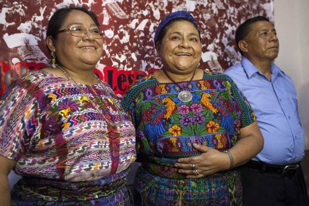 Indigenous activist Rigoberta Menchu (C) poses with her siblings, before a press conference in Guatemala City, capital of Guatemela, on Sept. 30, 2014. Menchu announced that the trial against a former police official accused of causing the death of 37 people in a fire at the embassy of Spain in Guatemala, including her father Vicente Menchu, will start on Wednesday. Luis Echeverria) (ce) GUATEMALA-GUATEMALA CITY-JUSTICE-TRIAL e LuisxEcheverria 