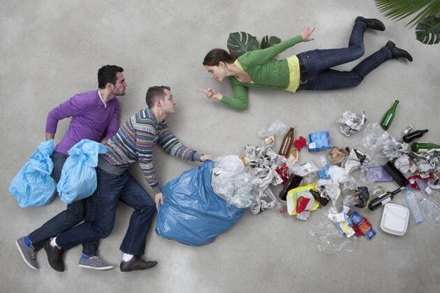 Woman pointing towards men throwing garbage model released  BAEF000240