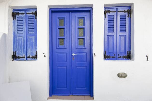 Greece, Cyclades, Thira, Santorini, Closed blue doors with windows  FOF002834