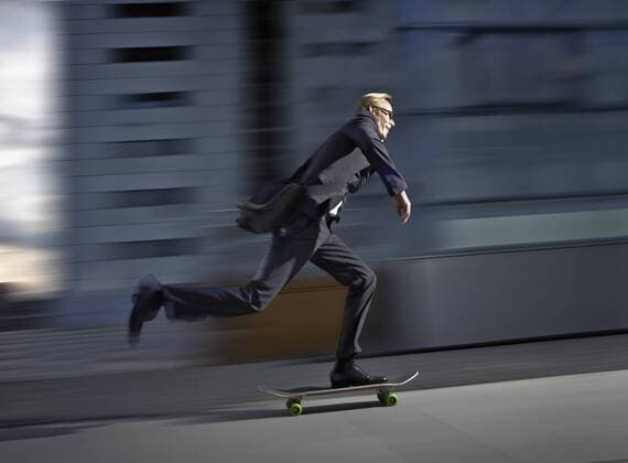 IMAGO Creative: Stadt-Dichotomien Germany, Cologne, Mature man skating on road model released  RHYF000358