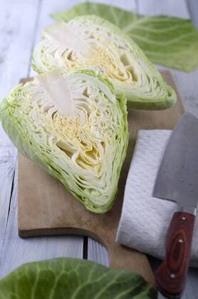 Pointed cabbage on wooden table  ODF000601