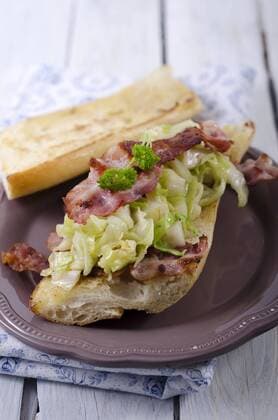 Garlic bread with bacon and pointed cabbage on plate  ODF000607