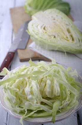 Pointed cabbage on wooden table  ODF000611