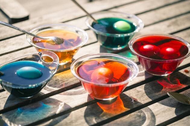 Germany, Bavaria, Colorful Easter eggs in dye  SARF000441