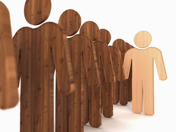 Figurines made of wood with one standing out from the crowd, illustration  UWF000007