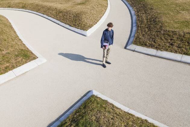 Germany, Baden-Wurttemberg, Teenage boy standing at crossing model released  WDF002412