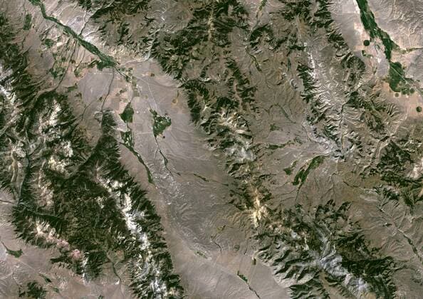 Beaverhead Meteor Impact Crater, Montana, Usa, True Colour Satellite Image. True colour satellite image of Beverhead impact structure, Montana, US (age : 600 million years ; diameter : 60 km). Image taken on 13 September 1999 using LANDSAT data. 913_03_PO00432