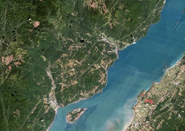 Charlevoix Meteor Impact Crater, Canada, True Colour Satellite Image. True colour satellite image of Charlevoix impact structure, Canada (diameter : 54 km). Image taken on 27 August 1989 using LANDSAT data. 913_03_PO00437