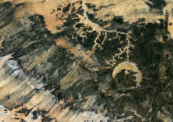 Gweni Fada Meteor Impact Crater, Chad, True Colour Satellite Image. True colour satellite image of Gweni-Fada impact structure, Chad (diameter : 14 km). Image taken on 19 January 1987 using LANDSAT data. 913_03_PO00443