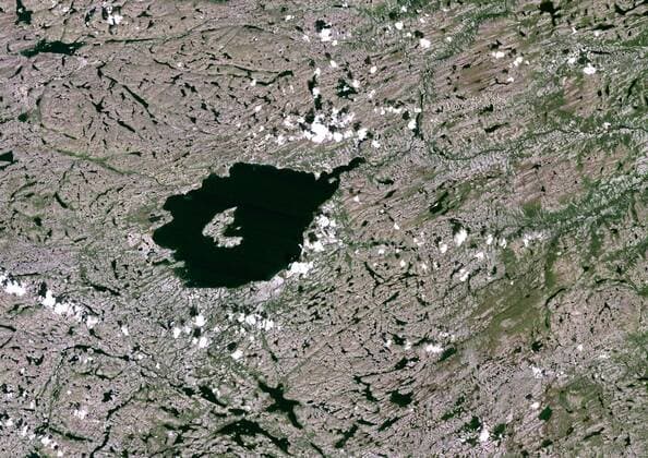 Mistastin Meteor Impact Crater, Labrador, Canada, True Colour Satellite Image. True colour satellite image of Mistastin impact structure, Labrador, Canada (diameter : 28 km). Image taken on 1 August 1987 using LANDSAT data. 913_03_PO00448