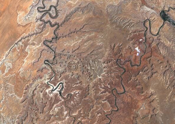 Upheaval Dome Meteor Impact Crater, Utah, Usa, True Colour Satellite Image. True colour satellite image of Upheaval Dome impact structure, Utah, US (age : 65 million years ; diameter : 5 km). Image taken on 17 June 1989 using LANDSAT data. 913_03_PO00459