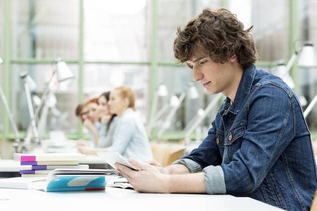 Student learning in a university library model released Symbolfoto property released  WESTF019708