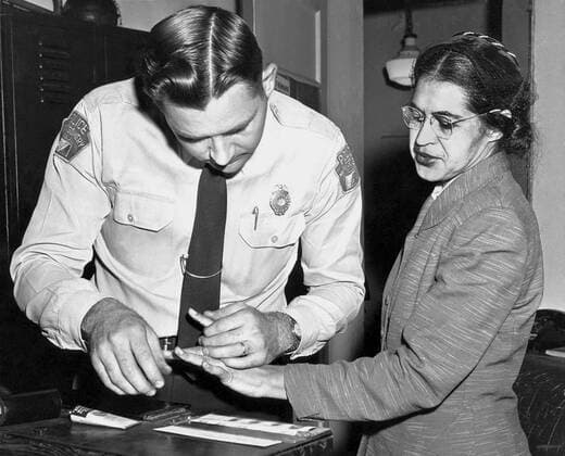 Montgomery, Alabama: 1956. Mrs. Rosa Parks, a Negro seamstress, being fingerprinted after her refusal to move to the back of a bus to accomodate a white passenger touched off the bus boycott in Montgomery, Ala. (Photo by Underwood Archives Getty Images) 990_05_7-Hist-CR_23HR
