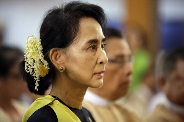 Myanmar s opposition National League for Democracy (NLD) leader Aung San Suu Kyi attends the opening ceremony of the Central Committee meeting for the NLD in Yangon, Myanmar, Dec. 13, 2014. ) MYANMAR-YANGON-NLD PARTY-CENTRAL COMMITTEE MEETING-AUNG SAN SUU KYI UxAung 