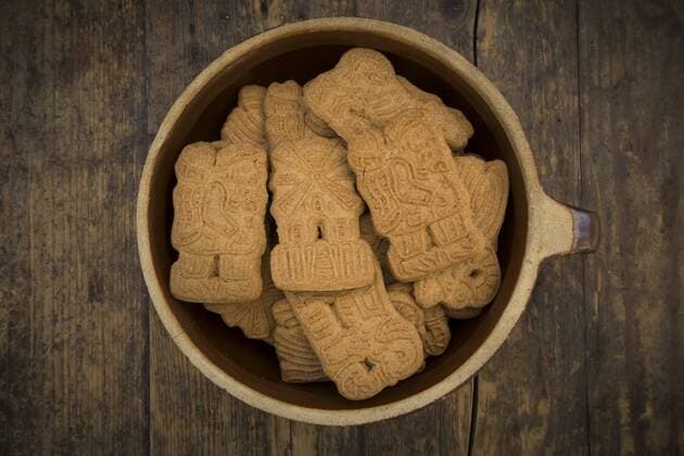 Bowl of almond biscuits on wood  LVF002440