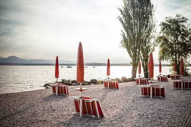 Italy, Peschiera del Garda, Lake Garda, coast at early morning  SBDF001435