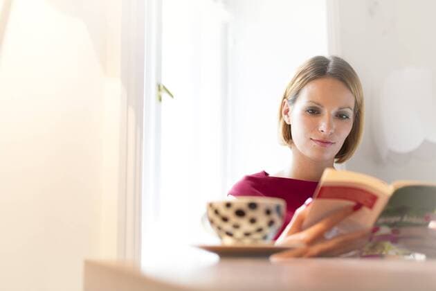 Woman reading book model released Symbolfoto property released  WESTF020473