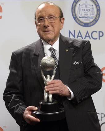 Record producer and music industry executive Clive Davis appears backstage with the Vanguard Award during the 46th NAACP Image Awards at the Pasadena Civic Auditorium in Pasadena, California on February 6, 2015. The NAACP Image Awards celebrates the accomplishments of people of color in the fields of television, music, literature and film and also honors individuals or groups who promote social justice through creative endeavors.  LAP2015020699 PHILxMCCARTEN