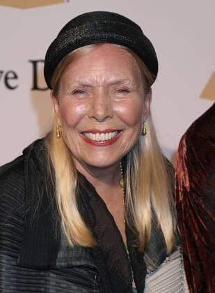 Joni Mitchell arrives on the red carpet before the annual Clive Davis Pre-Grammy Gala in Beverly Hills, California on on February 7, 2015.  LAP20150207561 DAVIDxSILPA