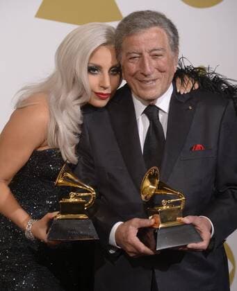 Lady Gaga and Tony Bennett appear appear backstage with the Grammy Awards they won for best Traditional Pop Vocal Album Cheek To Cheek at the 57th Grammy Awards at Staples Center in Los Angeles on February 8, 2015.  LAP20150208275 PHILxMCCARTEN