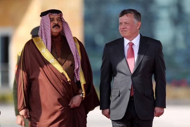 King Abdullah II of Jordan (R) inspects guards of honor with visiting King Hamad bin Isa Al Khalifa of Bahrain in Amman, capital of Jordan, on Feb. 9, 2015. ) JORDAN-AMMAN-BAHRAIN-VISIT MohammadxAbuxGhosh 