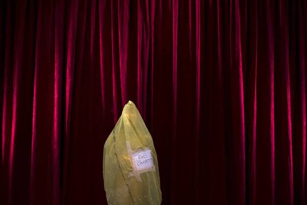 An Oscar statue is seen covered in protective plastic as preparations are underway for the 87th Academy Awards in the Hollywood section of Los Angeles on February 21, 2015. The Oscars will be presented on Sunday.  WAP20150221304 KEVINxDIETSCH
