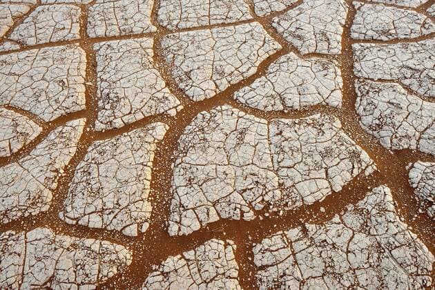 Namibia, Namib Desert, Sossusvlei, Cracked surface in salt and clay pan at Dead Vlei  ESF001535