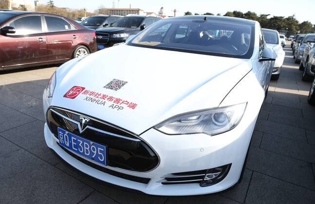 Tesla Model 3 BEIJING, CHINA - MARCH 03: (CHINA OUT) Tesla Model S is used as a media car of Xinhua APP by Xinhua News Agency during the opening ceremony of CPPCC on March 3, 2015 in Beijing, China. The Opening ceremony of the Third Session of the 12th Chinese People s Political Consultative Conference (CPPCC) was held at Great Hall of People on Tuesday.  CFP464079104