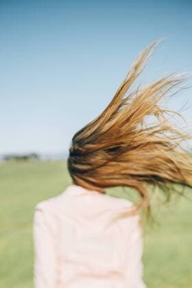 Wind moving long hair of a woman model released Symbolfoto  JPF000031