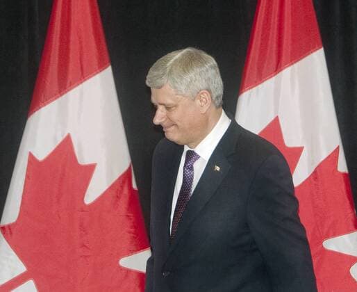 Canadian Conservative Prime Minister Stephen Harper leaves the stage after delivering opening remarks Saturday night in Vancouver to guests at the Canadian Iranian FoundationÕs 10th Annual Nowruz Gala in Vancouver, British Columbia, March 21, 2015.  VAP2015032103 HEINZxRUCKEMANN