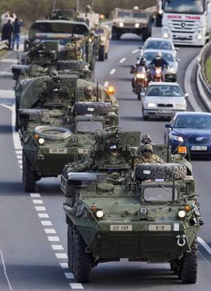 A US armored fighting vehicle Stryker enters Prague on Monday, March 30, 2015. The Dragoon Ride convoy started last week from Estonia and passed through Latvia, Lithuania and Poland before entering the Czech Republic on Sunday and continues Monday to Prague on a return journey to a German base. (CTKxPhoto VitxSimanek) CTKPhotoP201503300391101  VIS 005