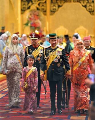 (150412)-- BANDAR SERI BEGAWAN, April 12, 2015 -- Brunei s Sultan Hassanal Bolkiah (2nd R front) attends the royal wedding ceremony of his son Prince Abdul Malik and Dayangku Raabi atul Adawiyyah Pengiran Haji Bolkiah in the Nurul Iman Palace in Bandar Seri Begawan, Brunei, April 12, 2015. )(azp) BRUNEI-ROYAL WEDDING-ABDUL MALIK zhengxjie 