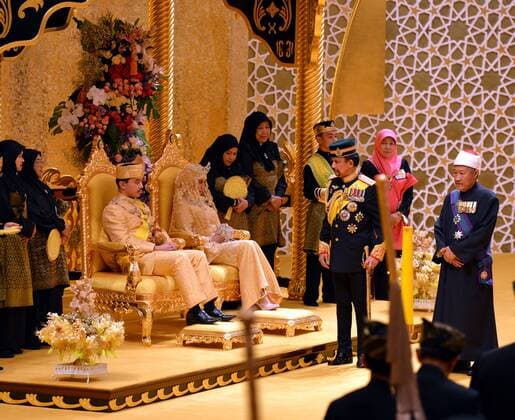 (150412)-- BANDAR SERI BEGAWAN, April 12, 2015 -- Brunei s Sultan Hassanal Bolkiah (2nd R front) attends the royal wedding ceremony of his son Prince Abdul Malik and Dayangku Raabi atul Adawiyyah Pengiran Haji Bolkiah in the Nurul Iman Palace in Bandar Seri Begawan, Brunei, April 12, 2015. )(azp) BRUNEI-ROYAL WEDDING-ABDUL MALIK ZHENGxJIE 