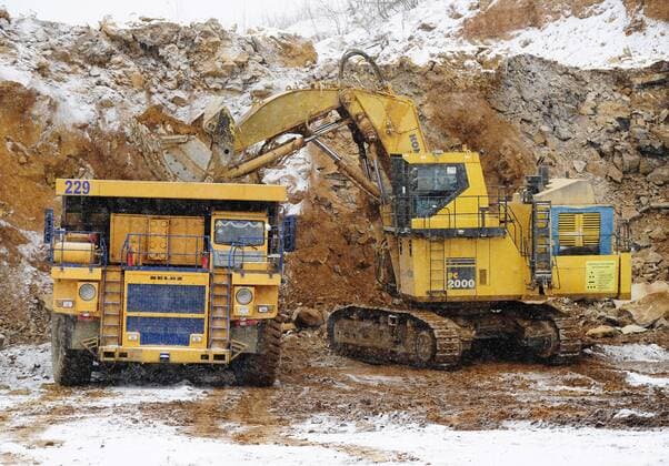 SAKHA, RUSSIA. APRIL 20, 2015. An excavator loading gold ore into a truck on the grounds of the Kuranakh gold field owned by AldanZoloto Mining Company. AldanZoloto is a subsidiary of Polyus Gold. Yuri Smityuk TASS  TS000937