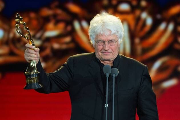 (150423) -- BEIJING, April 23, 2015 -- Director of the movie Wolf Totem Jean Jacques Annaud receives the Tiantan Award for Best Director during the awarding ceremony of the Tiantan Award of the fifth Beijing International Film Festival (BJIFF) in Beijing, capital of China, April 23, 2015. ) (mp) CHINA-BEIJING-FILM FESTIVAL-TIANTAN AWARD (CN) ChenxJianli 