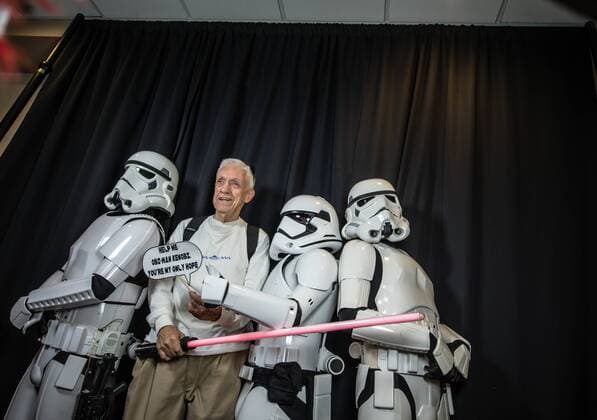 May 4, 2015 - Albuquerque, New Mexico, U.S. - Roberto E. Rosales .Students and community members got together Monday to celebrate Star Wars day known as May the Fourth be with you. Pictured is Ray Zielomski(cq)gets his portrait taken with a trio of storm troopers. Albuquerque, New Mexico Albuquerque U.S. - ZUMAab1_