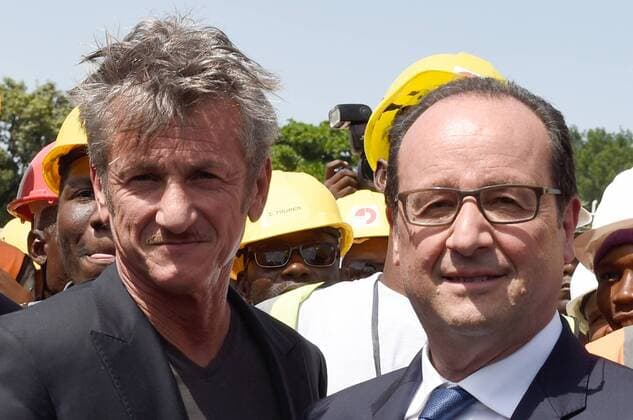 Actor Sean Penn, CEO of the J P Haitian relief Organization and French president Francois Hollande pose for a picture, as they tour the site of the future Haiti State University hospital, on May 12, 2015 in Port-au-Prince Haiti. Pool photo by Alain Jocard  WAX20150512211 ALAINxJOCARD