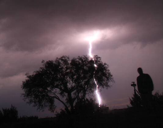 May 20 ,2015. Sonora TX. SoCal storm chaser Brad Mack(R) takes photos of a massive cloud to ground lighting strikes from severe thunder storms over the Sonora TX late Wednesday evening. More severe weather is forecast over the upcoming Memorial day weekend. .Photo by Gene Blevins LA DailyNews ZumaPress Sonora U.S. - ZUMAbl1_