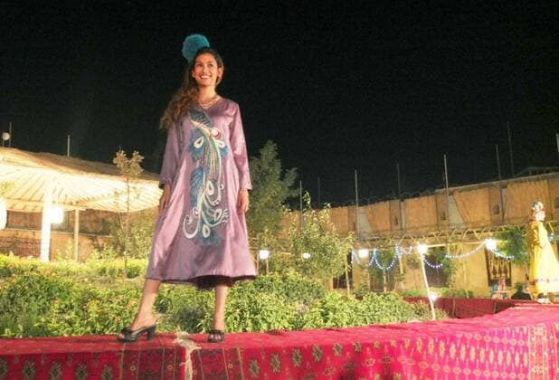 KABUL, Afghanistan - A fashion show of Afghan ethnic costumes is held in Kabul, the capital of Afghanistan, on July 6, 2012.  0707007