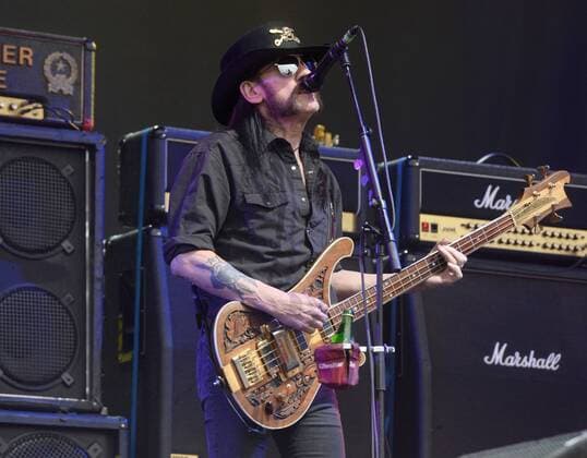 English rock musician Lemmy Kilmister of Motorhead is pictured performing live on stage during the second day of the Glastonbury Festival at Worthy Farm, Pilton in England. JUNE 27th 2015  PTYx152032