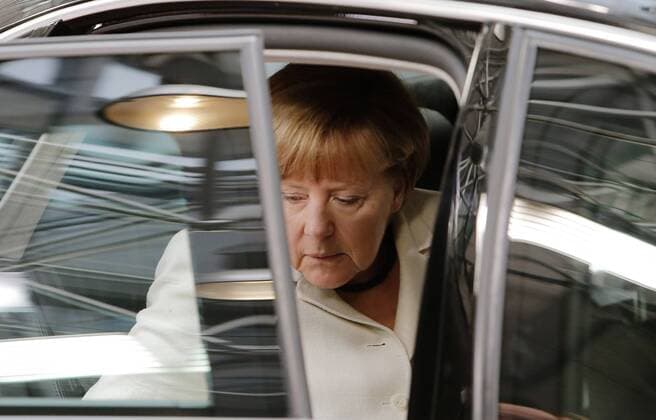 POLITIK EU-Gipfel: Ankunft der Teilnehmer BRUSSELS, German Chancellor Angela Merkel arrives for the Euro Summit at the European Union headquarters in Brussels, Belgium, July 12, 2015. The leaders of 19 eurozone member countries are gathering here on Sunday to discuss Greece s bailout program as the finance ministers meeting has come into a deadlock due to lacking of trust. Zhou Lei) BELGIUM-EURO SUMMIT-GREECE ?? 